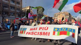 Activists of the ANPI (the association of Italian partisans) carry a banner with the slogan 'never again fascism' during the demonstration to demand the release of Abdullah Öcalan organized by UIKI (Kurdistan Information Office in Italy) in Rome.