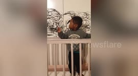Toddler steals eyeliner and doodles all over the walls