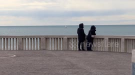 A person practices Wing Foil, also called Wing Surf or simply Wing, off the coast of Lido di Ostia on a February day in Rome.