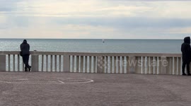 A person practices Wing Foil, also called Wing Surf or simply Wing, off the coast of Lido di Ostia on a February day in Rome.