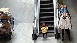 Young girl gets fingers trapped in shopping mall escalator after wandering away from parents