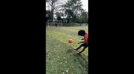 Kids Slow motion soccer kick. Free throw on goal.