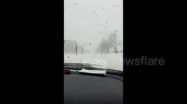 Canada: People skiing and jogging in shorts during snowstorm in Montreal