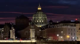 Shot of the dome of St. Peter's Basilica at dusk on Christmas Eve in Rome.
