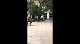 Boy Falls From Bike And Spills Mate