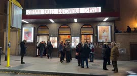 People before entering the Cinema delle Provincie, a small single-screen community arthouse cinema in Rome.