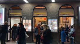 People before entering the Cinema delle Provincie, a small single-screen community arthouse cinema in Rome.