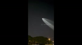 SpaceX Falcon 9 streaks across Santiago’s sky, framing a monumental view