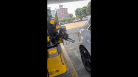 Fully automated refueling robot assists driver in China