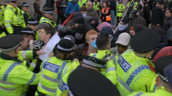 Chaos at UKIP rally in Manchester as counterprotestors clash with police and woman hit in the face by an officer