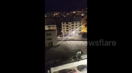 Israeli forces raid a residential building during their incursion into Al-Ma'ajin neighborhood