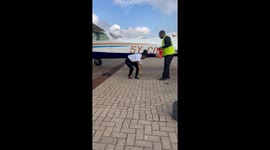Proud pilot gets doused in water to celebrate her first solo flight