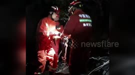China: Elderly Man Trapped in Mud Rescued