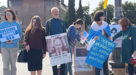 Demonstrators during the sit-in to demonstrate against the “Putin regime” and to promote the “Energy For Life” campaign by some Russian dissidents in Rome.