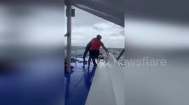 Philippines: Dramatic Rescue Unfolds as Coast Guard Saves 14 from Sinking Boat