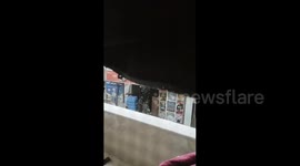 Israeli forces storm a supermarket in the town of Kafr Aqab, north of Jerusalem