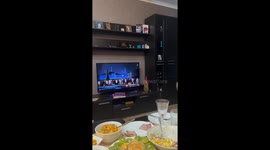 Dog stands on two legs during national anthem in Barnaul, Russia