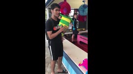 About to toss ALL the rings in a hat onto the bottle. Then I spot a HUGE seal randomly coming up to us. The camera pans and its hilarious.