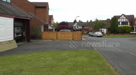 CVRT Sabre Tank Exiting Domestic Garage
