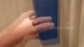 Man pours cold water on girlfriend in shower