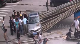 Tractor driver brakes suddenly causing bamboo sticks to pierce car