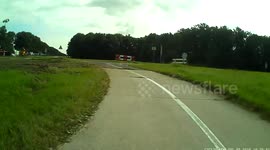 Car driver mistakes cycle path for road