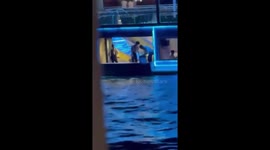 Cruise ship workers seen dumping rubbish in Bangkok river