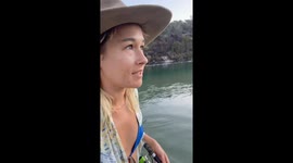 Aussie's stunned by dozens of sting rays swimming around their boat