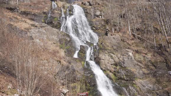 Beautiful and relaxing Waterfall in Todtnau, shining in the afternoon sun.