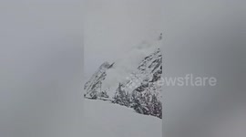 Avalanche crashes down snow-covered hillside in India