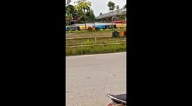 Barge crashes into bridge on river in Indonesia