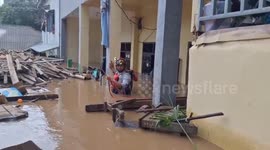 Dramatic Firefighters Evacuate Victims Trapped in Floods in Jakarta