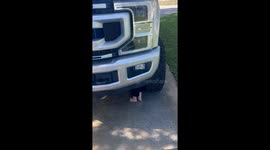 Two-year-old trying to 'fix' dad's truck ends up scratching paint