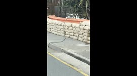 Two kite surfers try to fly in a cyclone Alfred Fail