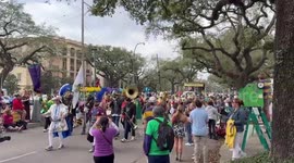 US: People Celebrate Mardi Gras Despite Inclement Weather 3