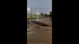 Car Stranded in Floodwaters as Heavy Rain Pounds Bahia Blanca, Argentina