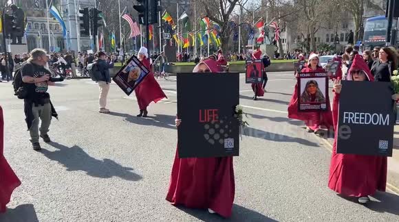 Protesters wearing The Handmaid's Tale costumes march through Central London for Women’s Day