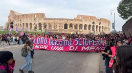 People marching in the procession of the feminist and transfeminist movement Non Una di Meno (Not One Less) on the occasion of International Women's Day in Rome.