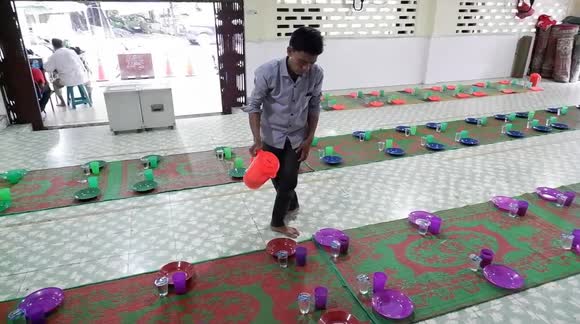 Muslims Break the Fast With Spicy Porridge in Indonesia