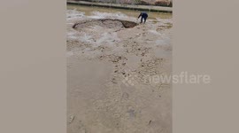 Hundreds of fish swallowed up by sinkhole in China
