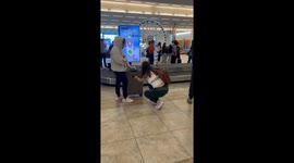 Woman thinks someone is stealing her suitcase before realising best friend has flown 4,000 miles to surprise her