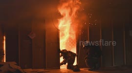 Door control during a live burn.