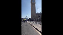 Fearless protester refusing to get down after climbing Big Ben