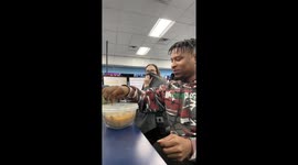 Woman gags as coworker eats chicken feet for lunch in the office