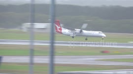 Plane wobbles as it battles to land during Cyclone Alfred in Australia