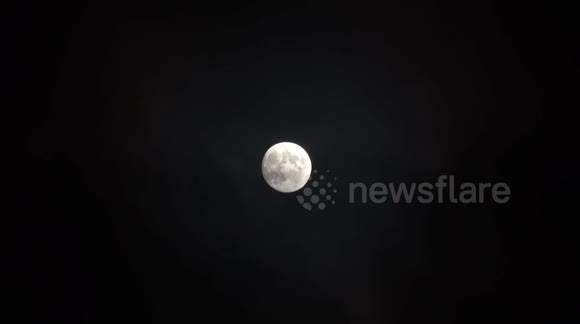 The March Full Moon also known as the Worm Moon high in the sky of Cambridge