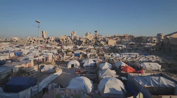 Footage of makeshift camp set up amongst rubble of destroyed buildings in Gaza's Jabalia