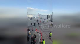 US: Terrifying Moment Passengers Flee Burning Plane at Denver Airport