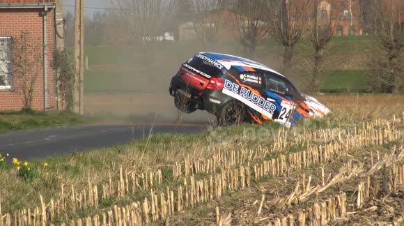 Car goes round in a bend and goes off the track