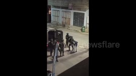 Israeli forces arrest a young man during their raid on Beit Furik, east of Nablus